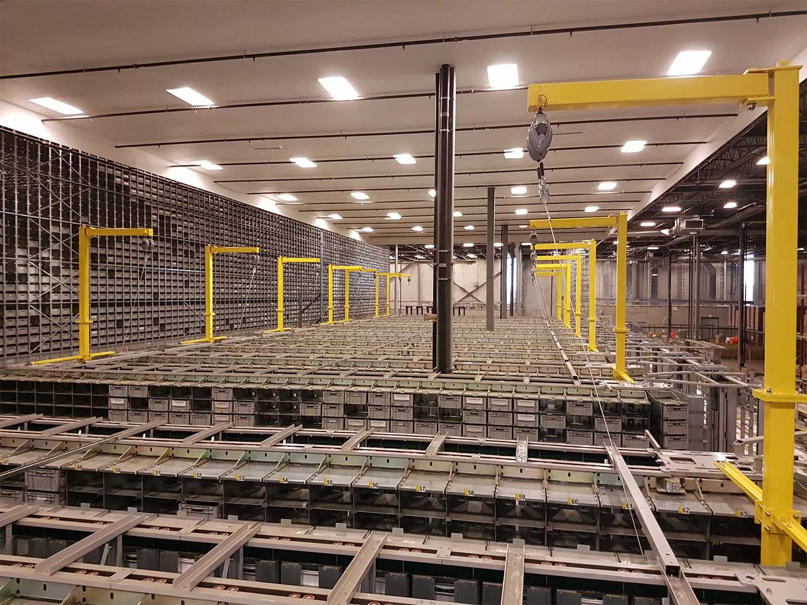 Fall protection system supporting safe material handling in industrial facility"