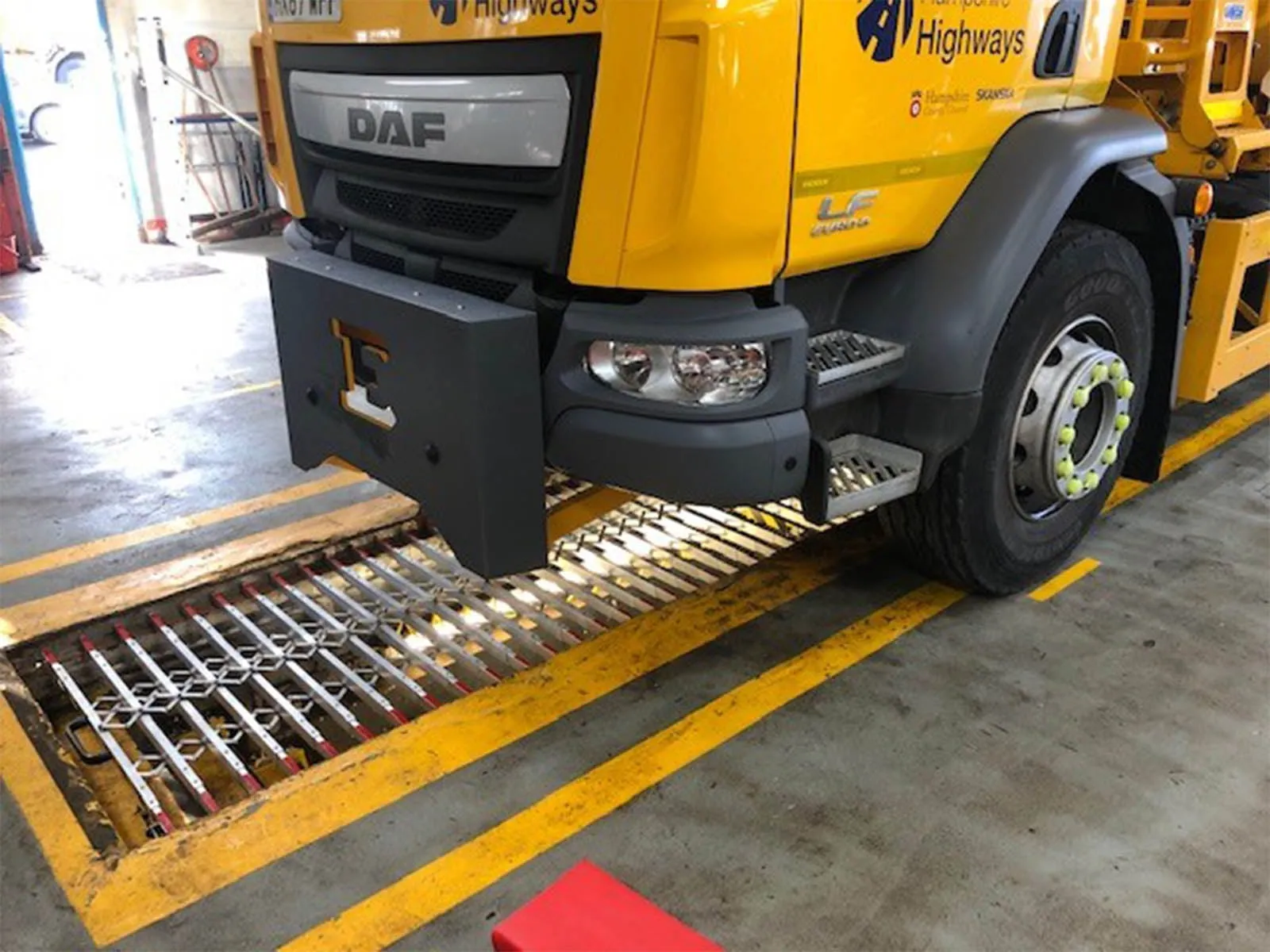 Fall protection pit cover system installed to prevent accidental falls in service area