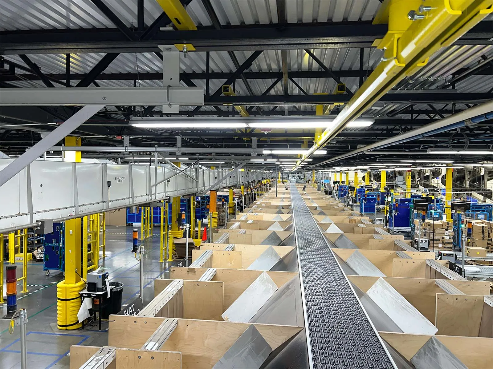 Fall protection system installed in warehouse racking and storage area