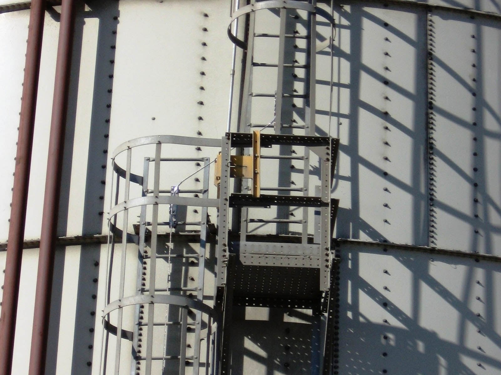Fall protection system installed for safe maintenance and access on agricultural silos