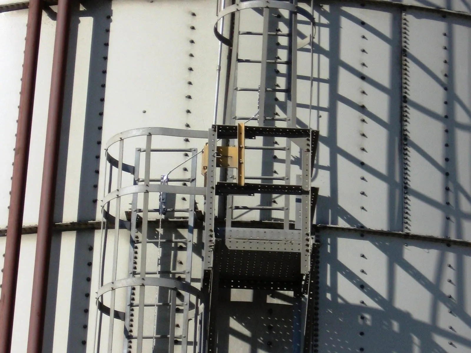 Fall protection system installed for safe maintenance and access on agricultural silos